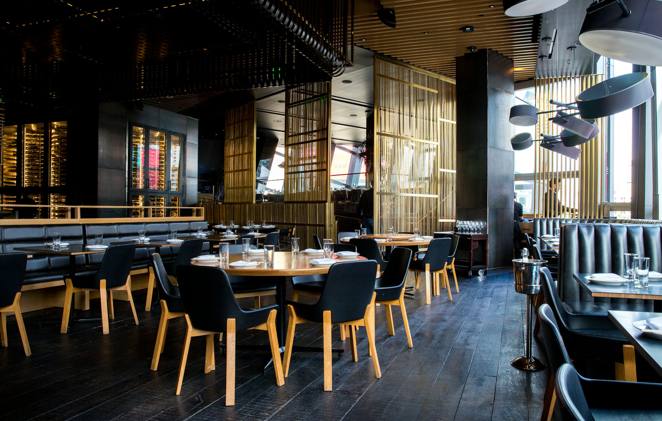 The dining room at Cendre, lit low
